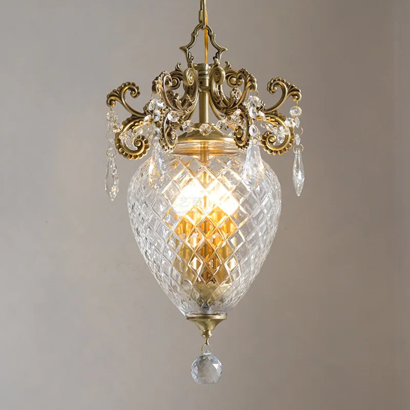 Ornate gold medieval-style pineapple chandelier with diamond-patterned crystal glass shade and sparkling accents.