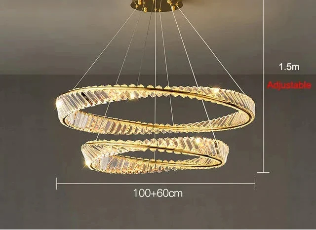 Gold chandelier with two rings, crystal accents, adjustable height and wires, includes remote control.