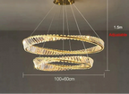 Gold chandelier with two rings, crystal accents, adjustable height and wires, includes remote control.