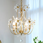 Ornate gold hallway chandelier with curved arms, crystal flowers, and hanging crystal ornaments.
