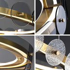 Close-up of Maison Ornate Art Deco Crystal Chandelier with gold rings, rods, and textured glass circles.