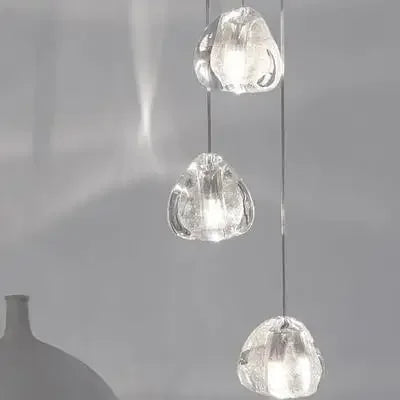 Set of three Maison Ornate modern crystal LED chandeliers with clear shades, long vertical design.
