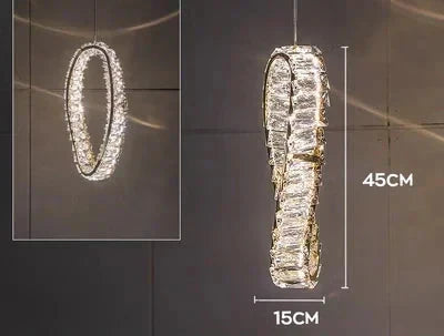 Oval vertical LED chandelier with clear crystals, gold accents; elegant, modern lighting fixture.