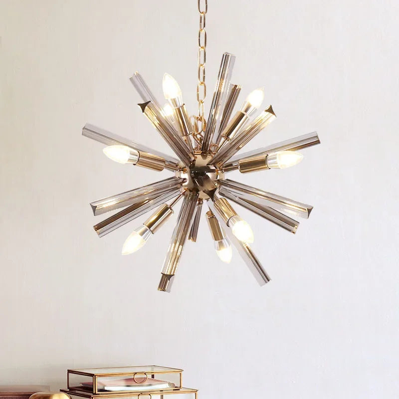Maison Ornate Crystal Dandelion Chandelier with radiant exposed bulbs and metallic rods on gold chain.