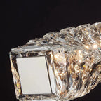 Close-up of Maison Ornate's LED crystal chandelier rings with faceted crystals and bright, dimmable LEDs.