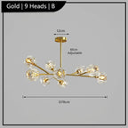Gold postmodern chandelier with nine glass bulbs, branching arms, LED lighting, and adjustable height.