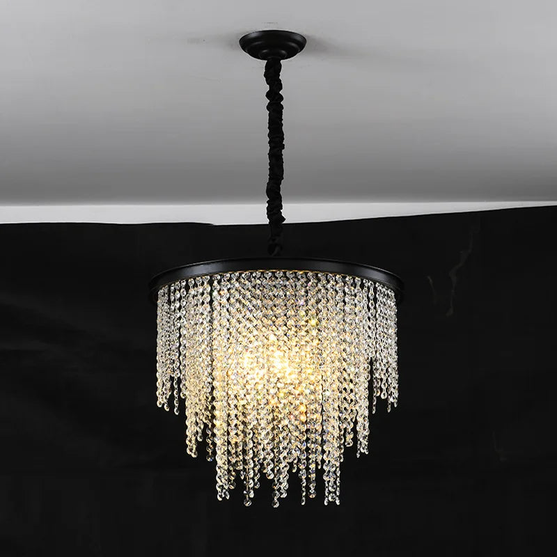 Maison Ornate Modern Crystal Chandelier with gold chain and cascading clear crystal prisms.