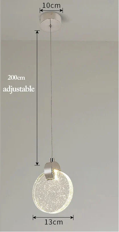Modern Nordic chandelier with a 13 cm crystal body, 200 cm adjustable cord, and soft LED glow.