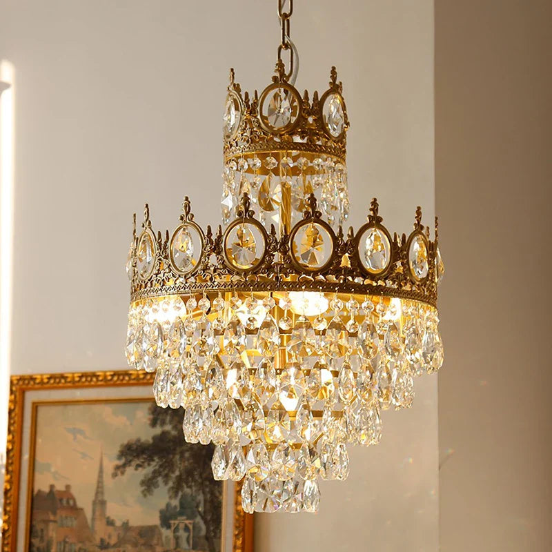 The Maison Ornate Crystal Ball Chandelier features gold accents and retro-inspired sparkling crystal design.