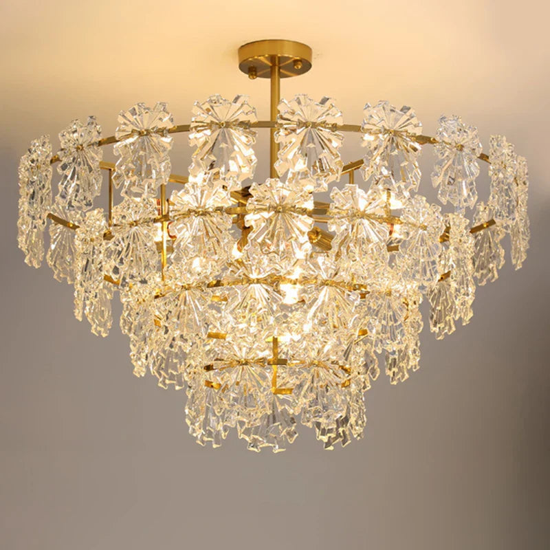 Elegant Maison Crystal Ball Chandelier features floral accents and warm light, a stunning decorative pendant.