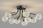 Maison Ornate Crystal Ball Chandelier with LED stars, black arms, clear glass globes.