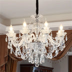 Maison Ornate Large Crystal Chandelier with six bulbs, glass arms, and sparkling crystal droplets.