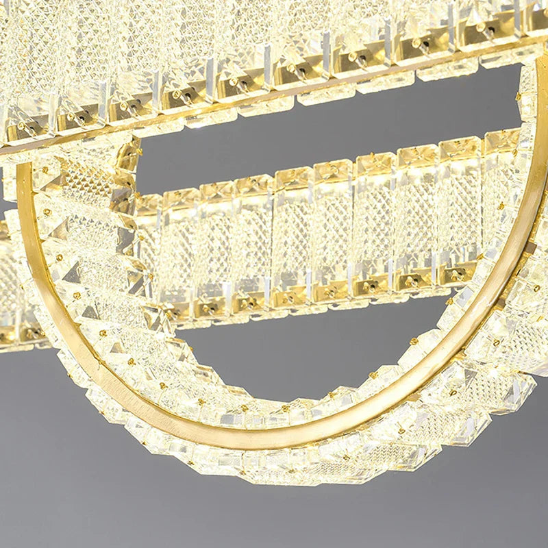 Maison Ornate Modern LED Crystal Pendant Light with gold frames and rectangular crystal blocks.