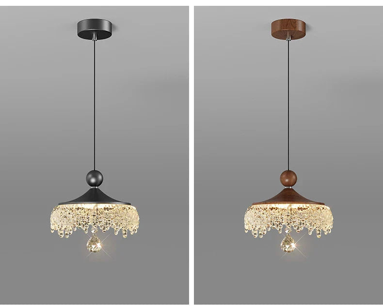 Two Maison Ornate French Medieval style crystal teardrop chandeliers with black and brown tops, elegant crystal fringe.