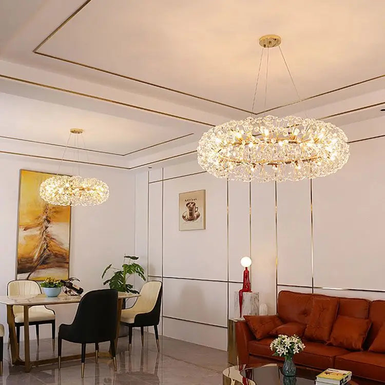 Two Maison Ornate Crystal Bedroom Chandeliers featuring gold metal accents and intricate crystal detailing.