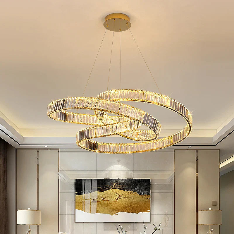 Maison Ornate Art Deco Crystal Chandelier features minimalist LED rings suspended by slim wires.