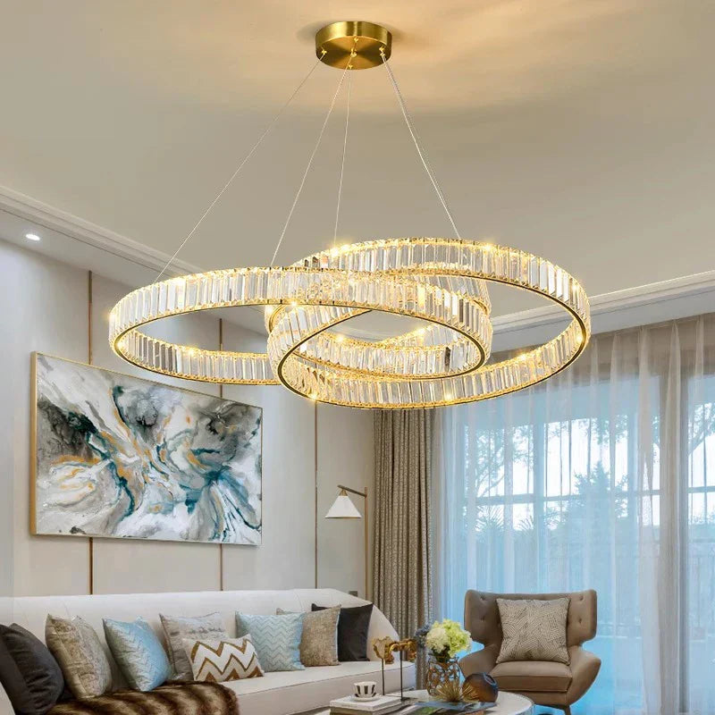 Maison Ornate Elegant Modern Industrial Crystal Glass Chandelier with intricate crystal and metal detailing, suspended elegantly.