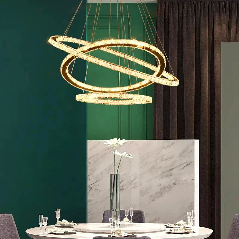 Maison Ornate Modern LED Crystal Hanging Light chandelier with elegant crystal design, suspended above for contemporary lighting.