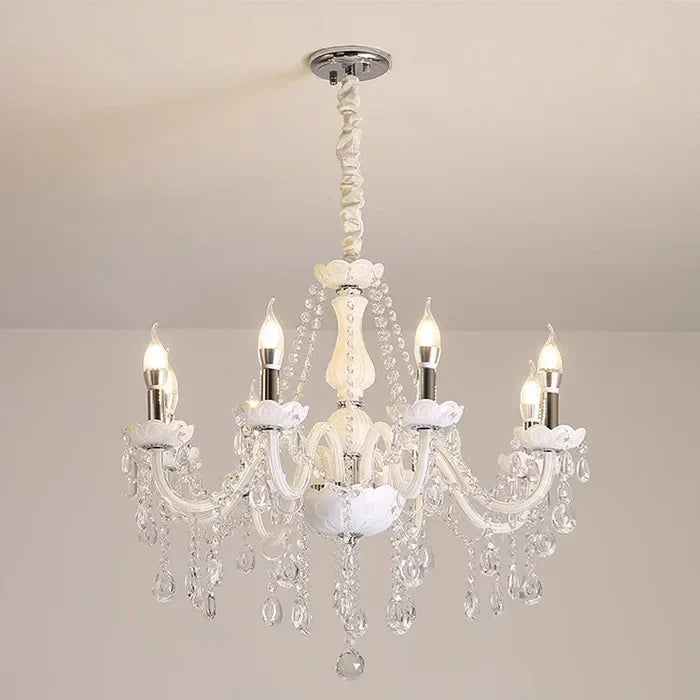 Baroque Nordic chandelier with five candle bulbs, curved glass arms, and crystal accents hanging from a fabric chain.
