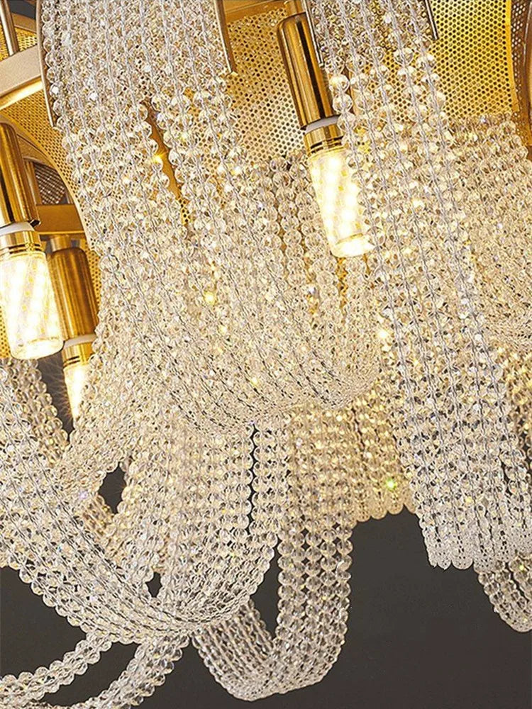 Close-up of Maison Ornate Modern Nordic Crystal Chandelier, golden fixtures and LED-lit crystal strands.