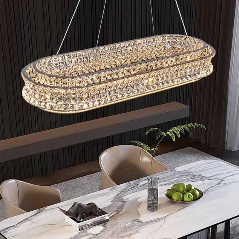 Maison Ornate Crystal Ball Pendant with stainless steel adjustable cord, modern spherical chandelier lighting.
