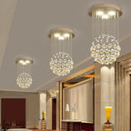 Four Maison Ornate Modern Spherical Crystal Chandelier Polished Steel LED lights with cascading crystals.