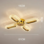 Gold-finished LED chandelier with four oval crystal-like loops in a cross pattern, elegant and modern.