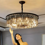 Maison Ornate Modern Crystal Chandelier with geometric framework, glowing lights, and cascading hanging crystals.