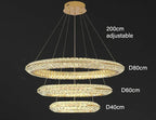 Three-tiered modern crystal LED chandelier with adjustable cables, featuring 80 cm, 60 cm, and 40 cm circular tiers.