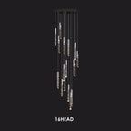 Modern crystal chandelier with chrome frame, 16 cylindrical glass pendants, round black ceiling mount.