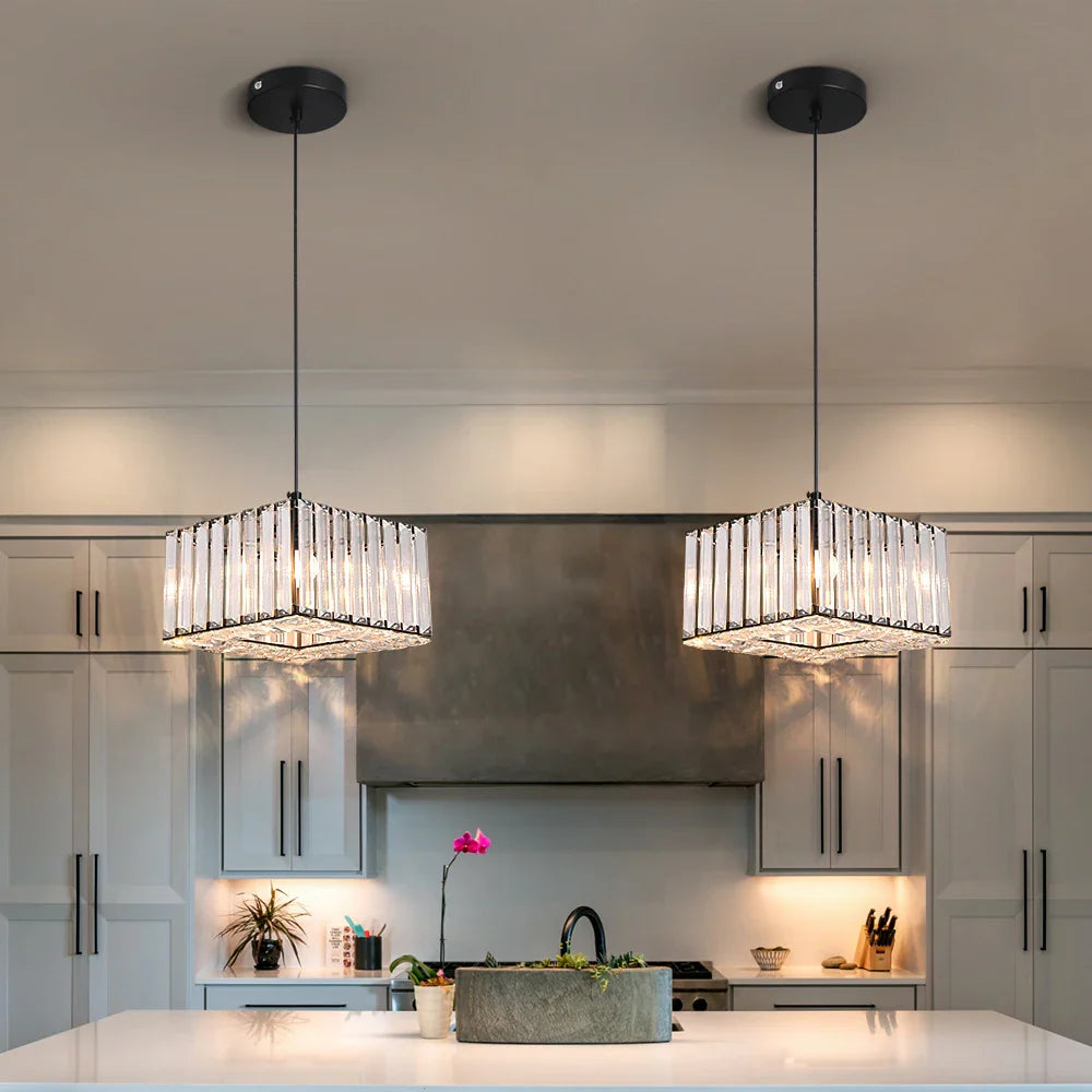 Pair of Maison Ornate Elegant Art Deco crystal chandeliers with adjustable lighting, shown suspended.