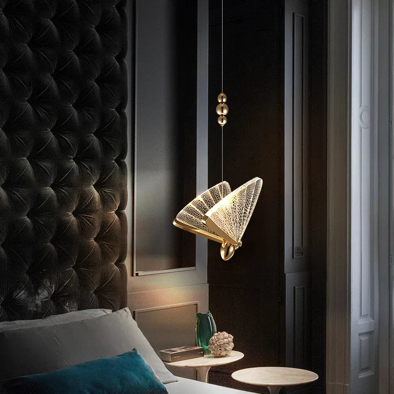 Maison Ornate Modern Crystal Chandelier with gold accents, suspended elegantly, sparkling in natural daylight.