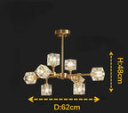 Six-crystal cube chandelier with gold arms and LED lighting, 62 cm wide, 48 cm tall.