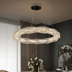 The Maison Ornate K9 Crystal Industrial Chandelier, oval LED design, sparkles with luxurious brilliance.
