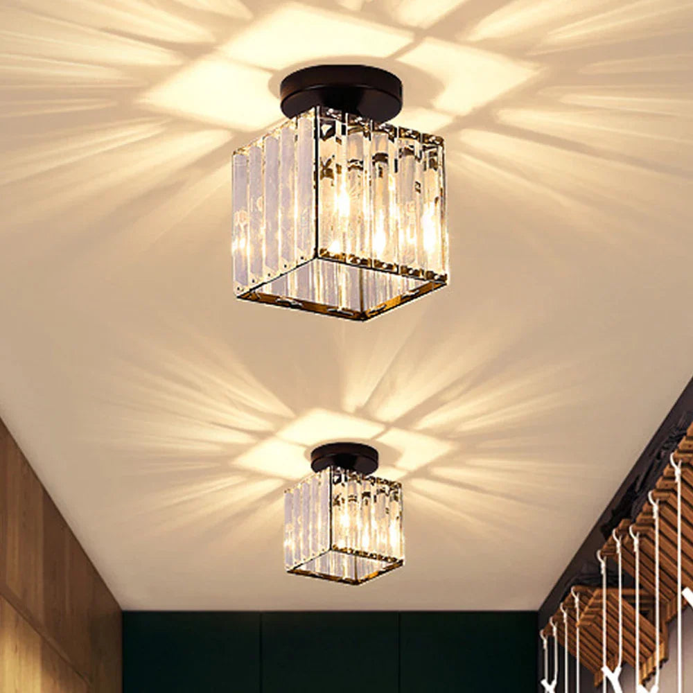 Pair of Maison Ornate Crystal Hallway Chandeliers featuring modern industrial design and intricate geometric patterns.