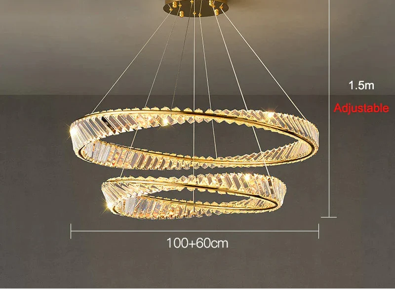 Two intertwined gold and crystal chandelier rings with LED lighting and adjustable hanging height.