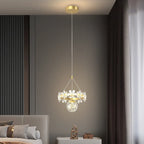 Maison Ornate Minimalist Single-Head Crystal Ball Pendant Light with floral designs and luminous bulb.