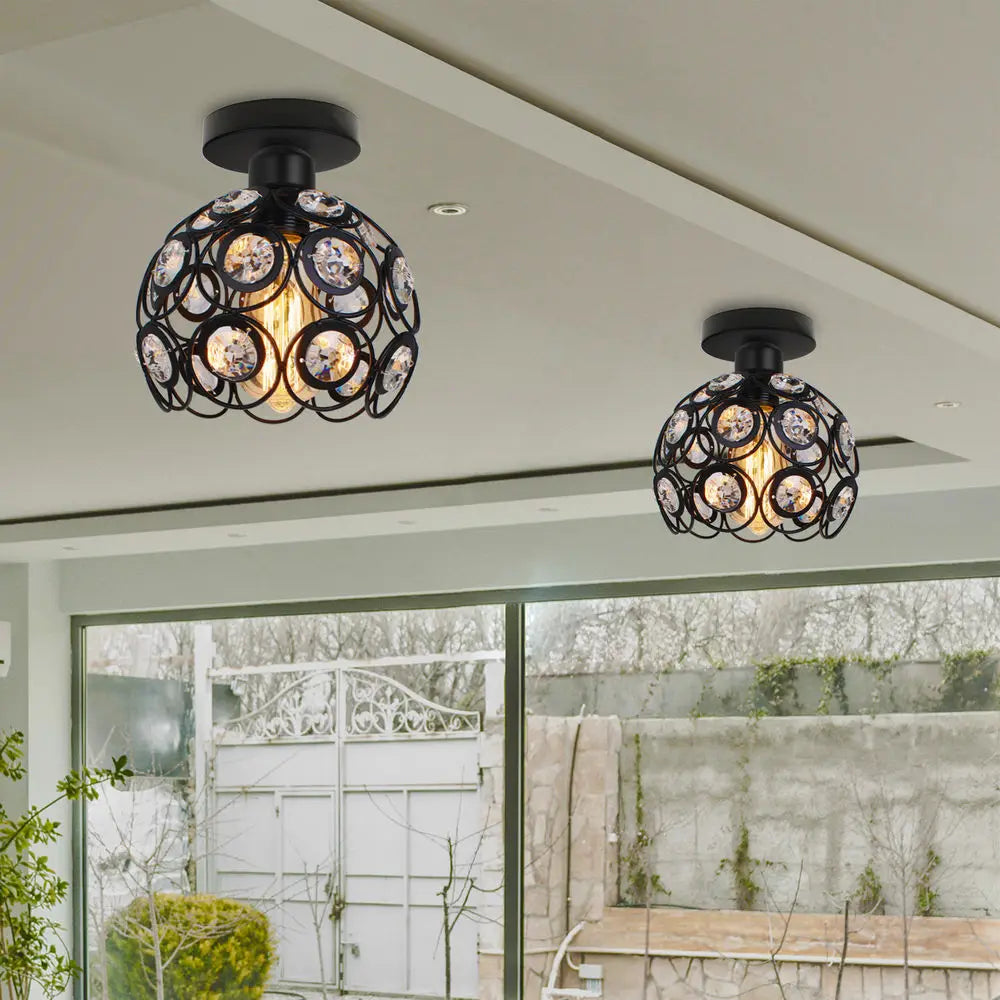 Pair of Maison Ornate crystal ceiling lights with black finish and layered sparkling crystal accents.