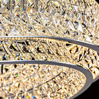 Ornate crystal ball chandelier with stainless steel rings, sparkling crystals, and adjustable hanging cord.