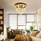 Maison Ornate Modern Crystal Ball Chandelier with romantic LED lights, suspended elegantly overhead.