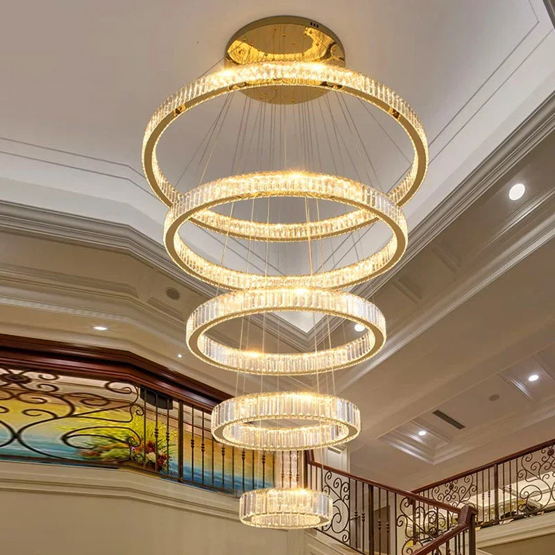 Maison Ornate Modern Crystal Chandelier with five LED-lit spiral rings, elegant and decorative.