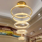 Maison Ornate Modern Crystal Chandelier with five LED-lit spiral rings, elegant and decorative.