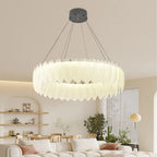 The Maison Ornate Crystal Ball Chandelier with decorative feathers and glass embellishments.