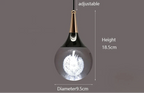 Teardrop glass LED chandelier with white dandelion pattern, adjustable drop, 18.5x9.5 cm ceiling-mounted.