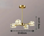 Modern gold-arm chandelier with cube glass shades, variable shape, LED lighting, 37.5x42 cm.