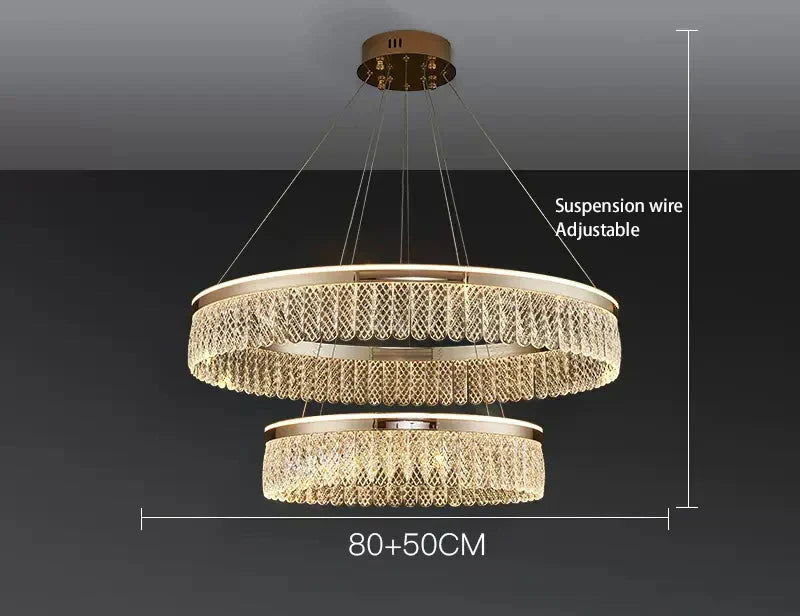 Two gold-tone rings with crystal-like chains form a modern, adjustable luxury chandelier.