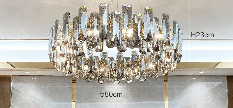 Large circular crystal LED chandelier with faceted glass and lit bulbs, measures 80 cm diameter.