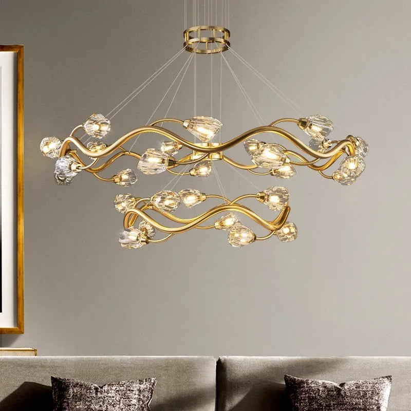 Maison Ornate Modern LED Crystal Pendant with two wavy gold arms and sparkling crystal bulbs.