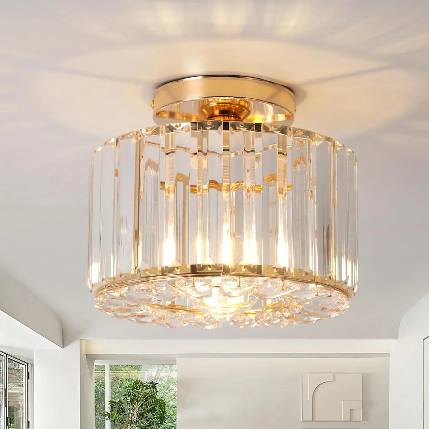 Ornate Art Deco chandelier with iron frame, vertical crystal prisms, round base, modern style.