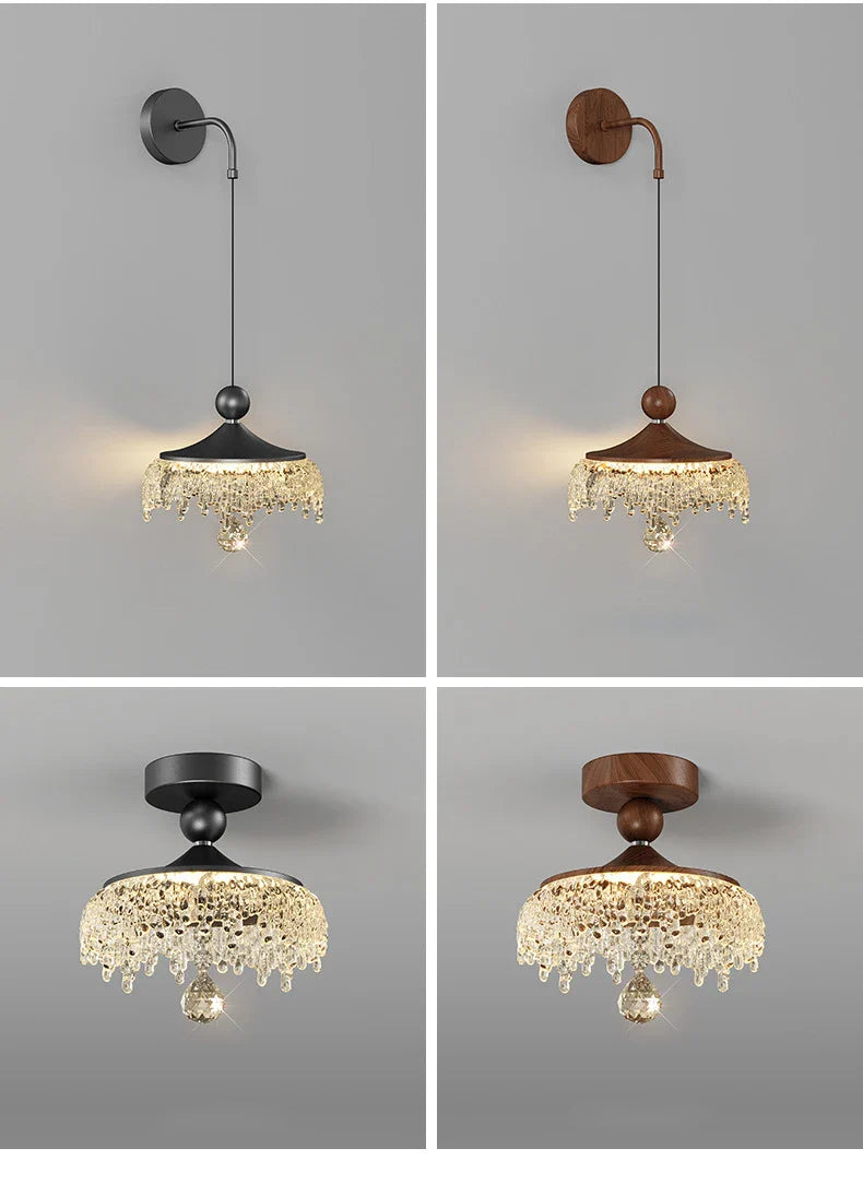 Set of four ornate French medieval chandeliers with teardrop crystals, black/brown canopies, warm lighting.